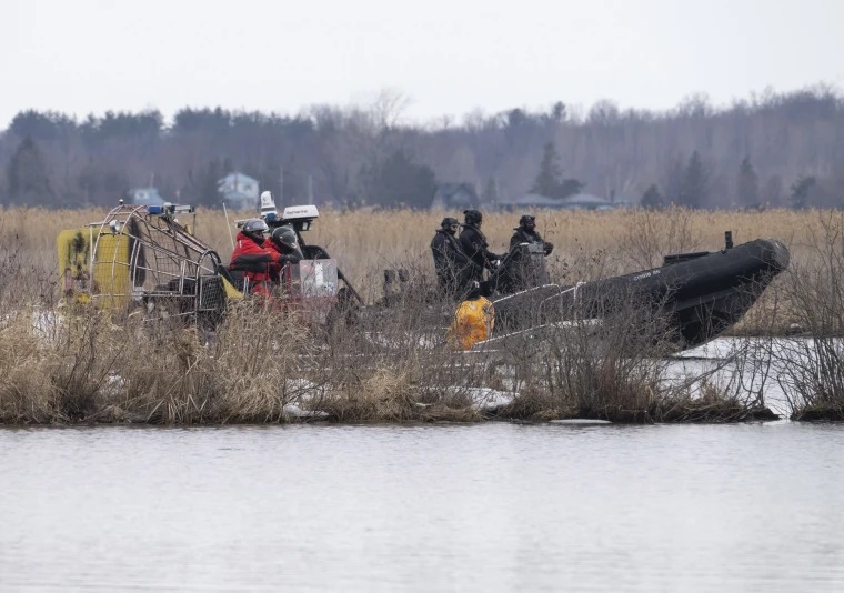Rescatan en lago helado a nueve hombres que trataban de entrar a EEUU